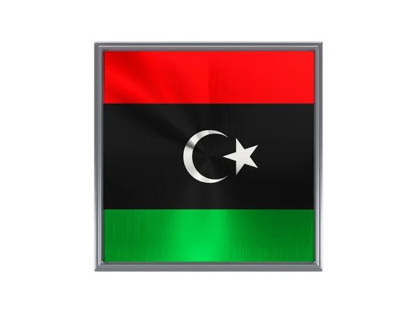 Quadratischer Metallknopf mit libyscher Flagge — Stockfoto