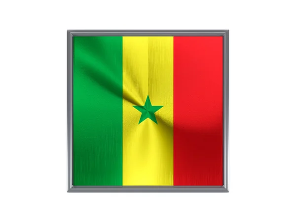Bouton carré en métal avec drapeau de senegal — Photo