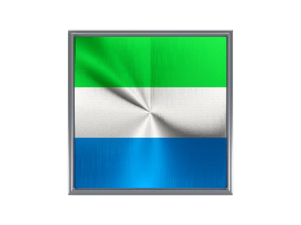 Square metal button with flag of sierra leone — Stok fotoğraf