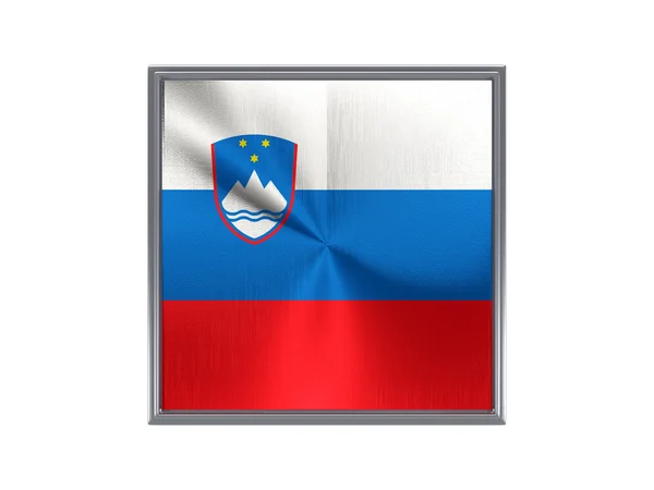 Square metal button with flag of slovenia — стокове фото