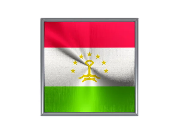 Bouton carré en métal avec drapeau du Tadjikistan — Photo