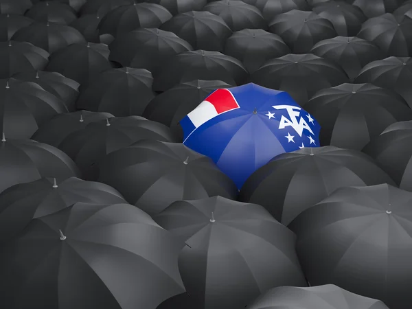 Зонтик с флагом французских южных территорий — стоковое фото