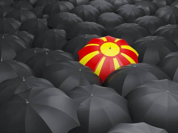 Guarda-chuva com bandeira de macedônia — Fotografia de Stock