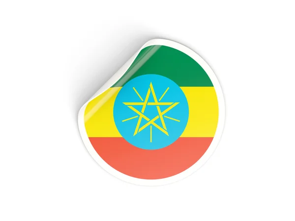 Круглая наклейка с флагом Эфиопии — стоковое фото