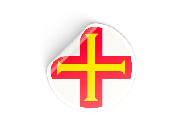 Adesivo rotondo con bandiera di guernsey — Foto Stock