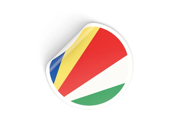 Rund klistermärke med flagga Seychellerna — Stockfoto