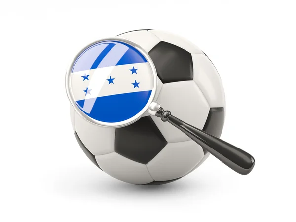 Fútbol con bandera magnificada de honduras — Foto de Stock