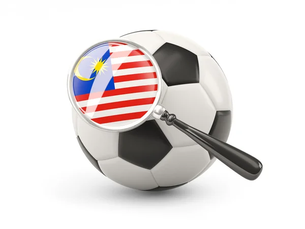 Fútbol con bandera de Malasia magnificada — Foto de Stock