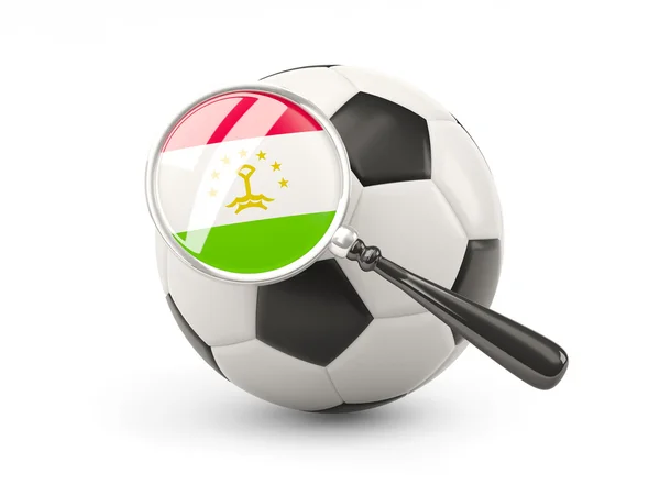 Football with magnified flag of tajikistan — Stock fotografie