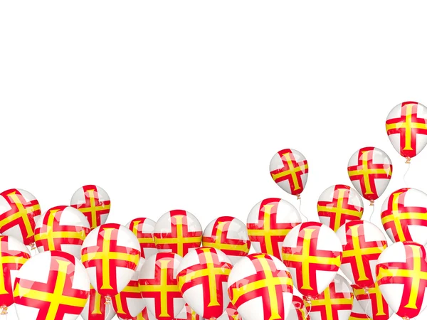 Guernsey bayrağı ile uçan balonlar