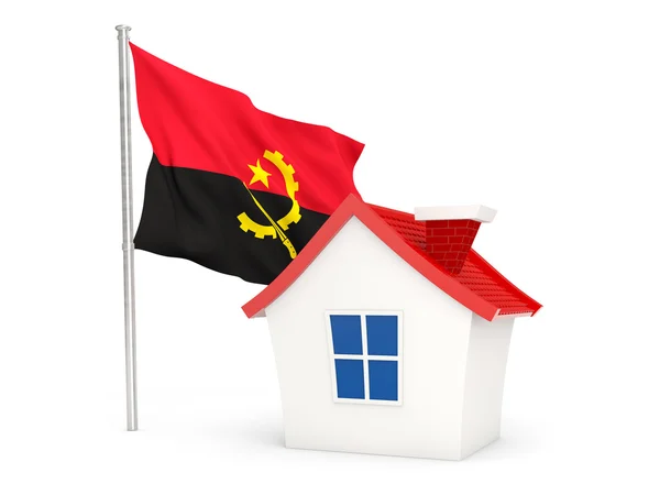 House with flag of angola — стокове фото