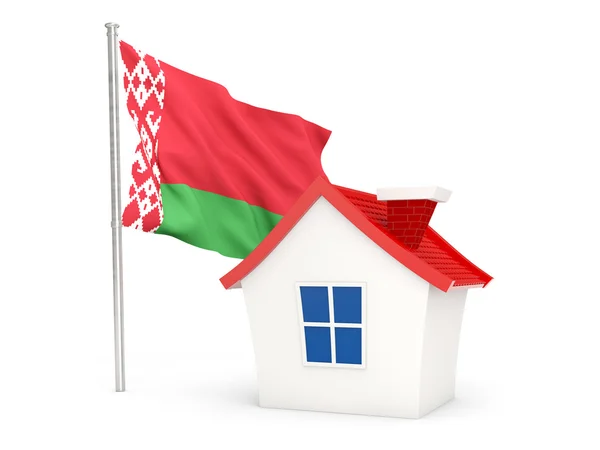 House with flag of belarus — стокове фото