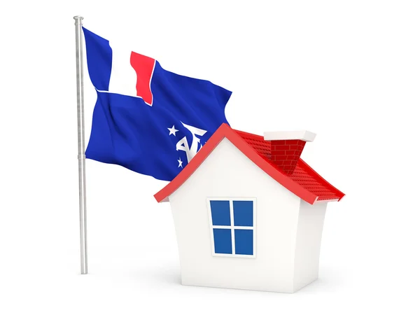 House with flag of french southern territories — стокове фото