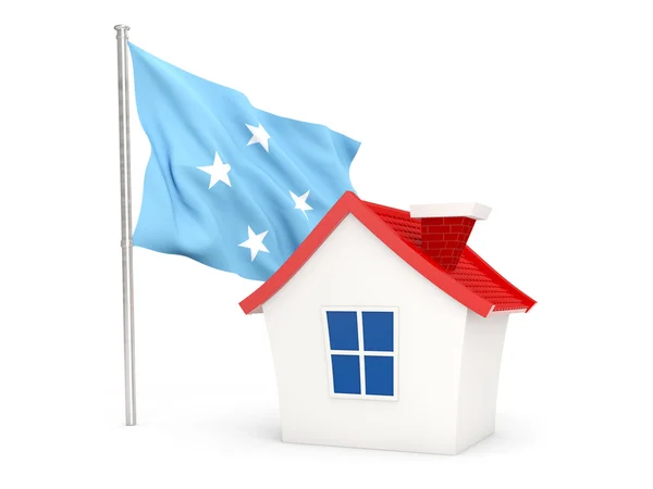 House with flag of micronesia — Stockfoto