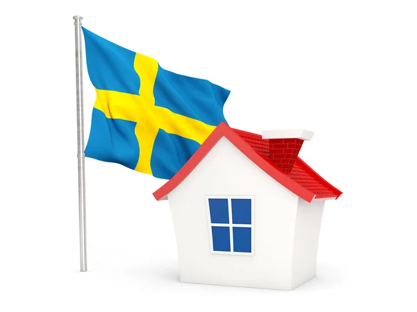 House with flag of sweden — Stockfoto