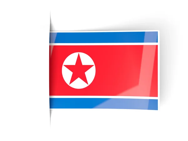 Kuzey Kore bayrağı etiketle kare — Stok fotoğraf