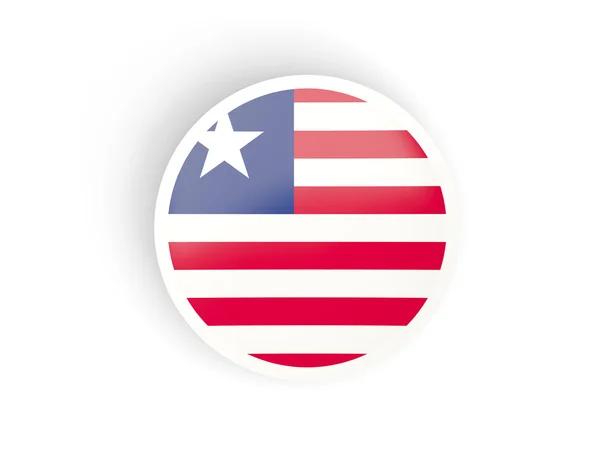 Στρογγυλό αυτοκόλλητο με τη σημαία της Λιβερίας — Φωτογραφία Αρχείου