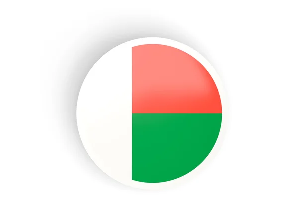 Adesivo redondo com bandeira de madagascar — Fotografia de Stock