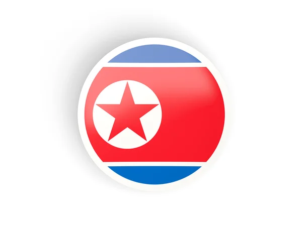 Okrągłe naklejki z banderą Korei Północnej — Zdjęcie stockowe