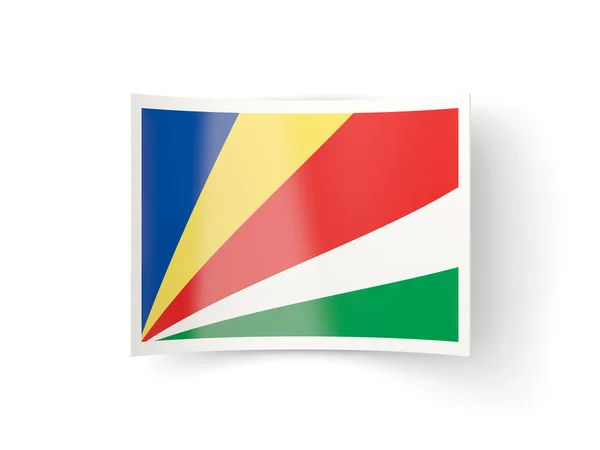 Seyşel Adaları bayrağı ile bükülmüş simgesi — Stok fotoğraf
