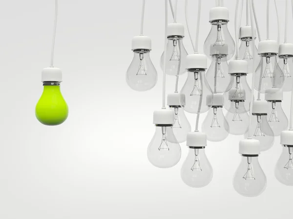 Lâmpada verde com lâmpadas regulares — Fotografia de Stock