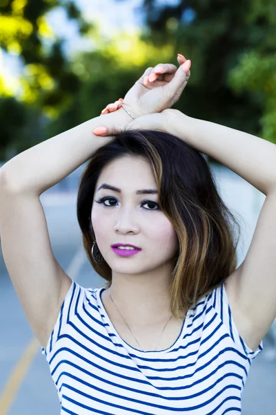 Asian American Woman Outdoor Portrait Arms On Head — Stock Photo, Image