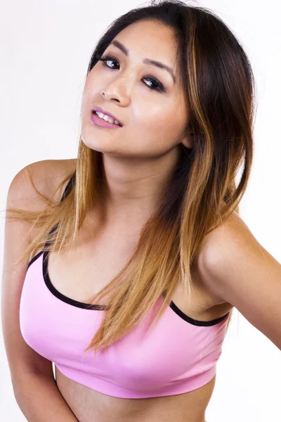Flaco asiático americano mujer rosa ejercicio superior — Foto de Stock