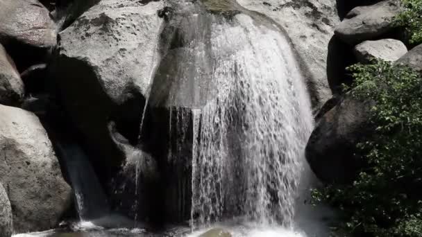 Tight Shot Of Water Cascading Over Rocks Yosemite — Stock Video