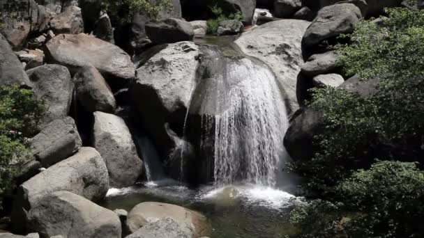 Mid Shot Of Water Cascading Over Rocks Yosemite — Stock Video