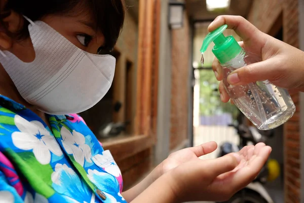 Southeast Asian Boy Using Liquid Gel Hand Sanitizer Protection Infectious — Stock Photo, Image