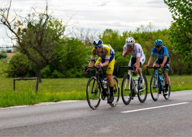 Hungary May 12, 2021: The Belgian (Yellow Blue) leading in Stage 1. between Siofok and Kaposvar (183 km). 