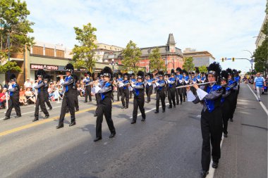 Victoria Canada - May 22,2017: Unidentified Marching Band in Victoria Day Parade along Douglas Street. This is Victoria's largest parade and attracting well over 100,000 people from Canada and USA.