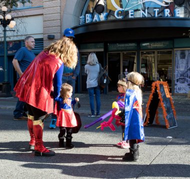 Victoria, Bristish Columbia, Canada - October 29, 2017: Unidentified participants dressed in character outfit at Wicked Victoria street festival.