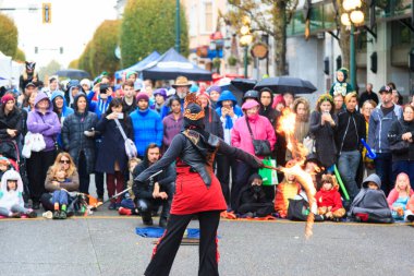 VICTORIA, CANADA - OCTOBER 31, 2016: People wearing Halloween, creative costumes, makeup on Wicked Victoria Day. The city has a torrid history that come to life at Halloween.