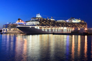 VICTORIA, BC, CANADA - JUN 26, 2016: Cruise ships at night in Victoria. Ogden Point 