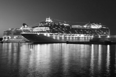 VICTORIA, BC, CANADA - JUN 26, 2016: Cruise ships at night in Victoria. Ogden Point 