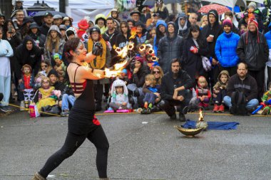 VICTORIA CANADA - OCTOBER 31, 2016: Crowded downtown with happy joyful people wearing Halloween, creative costumes,makeups on Wicked Victoria Day. The city has a torrid history that come to life at Halloween.