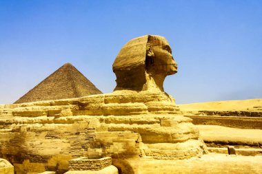 Pyramid and Sphinx at Giza, Egypt. The world's oldest tourist attraction, the Pyramids of Giza are 5000 years old.