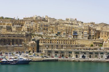Malta, Valletta - May 20, 2009: View of Valletta's Grand Harbor with her architecture. Valletta is the capital city of Malta and has the population of 6,444. Founded in 1565 by the Order of St John