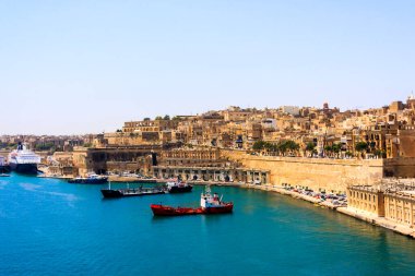 Malta, Valletta - May 20, 2009: View of Valletta's Grand Harbor with her architecture. Valletta is the capital city of Malta and has the population of 6,444. Founded in 1565 by the Order of St John