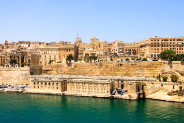 Malta, Valletta - May 20, 2009: View of Valletta's Grand Harbor with her architecture. Valletta is the capital city of Malta and has the population of 6,444. Founded in 1565 by the Order of St John