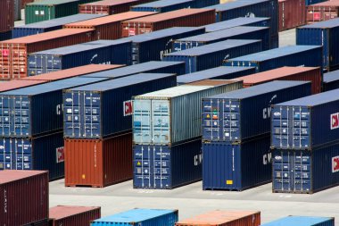 Alexandria Egypt - 18 May, 2009: Sea containers stacked organized and placed algorithmically for efficient transport in the international cargo terminal.