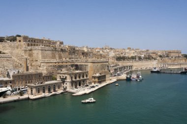 Malta Valletta - May 20 2009: View of Valletta's Grand Harbor with architecture. Valletta is the capital city of Malta and has the population of 6,444. Founded in 1565 by the Order of St John