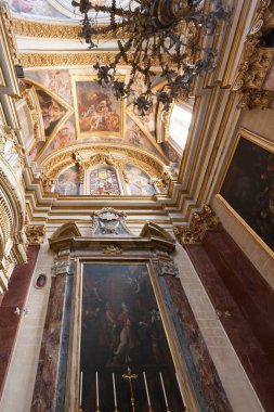 VALLETTA MALTA - MAY 20 2009: Interior of St. Paul's Cathedral on the background of Rabat square in the city of Mdina.The city of Silence