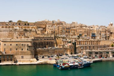 Malta Valletta - May 20 2009: View of Valletta's Grand Harbor with architecture. Valletta is the capital city of Malta and has the population of 6,444. Founded in 1565 by the Order of St John