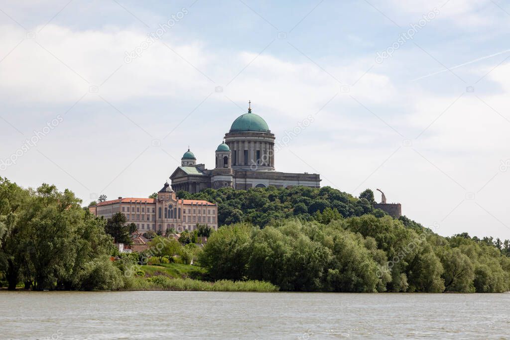 View of the Esztergom Basilica at the Castle Hill from the opposite bank of Danube, Hungary. The Latin motto on the temple frieze reads: Seek those things which are above. It's a World Herotage Site.