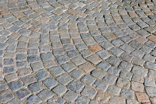 Pedras cobertas na rua — Fotografia de Stock