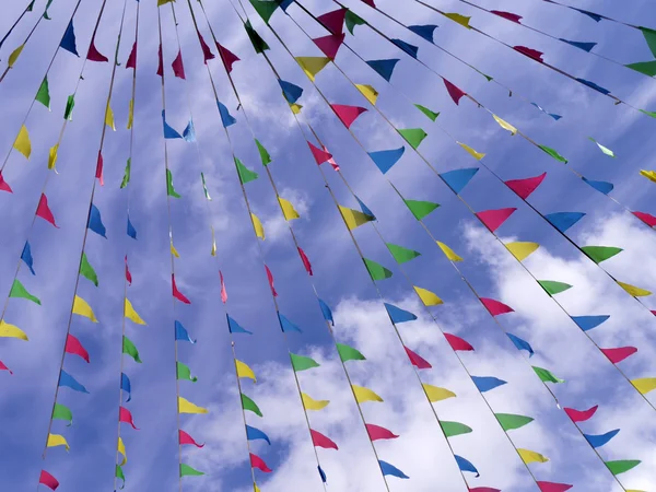 Colorful bunting in sky — Stock Photo, Image