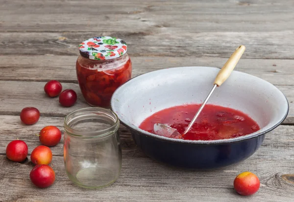 Plum jam and capacity for conservation — Stock Photo, Image
