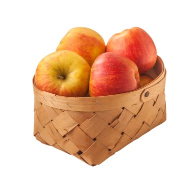 Beyaz bir arka planda sepetteki elma kış şampiyonunu izole et